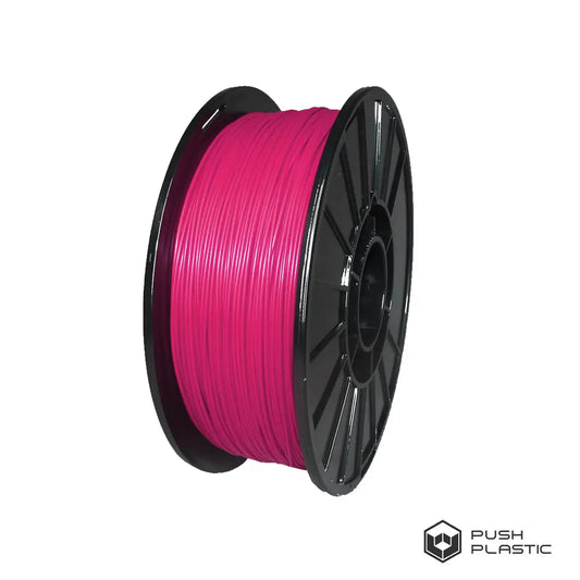 Spool of pink filament on a black spool with 'Push Plastic' branding.