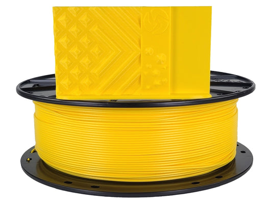 Spool of yellow material with a large yellow block on top against a white background