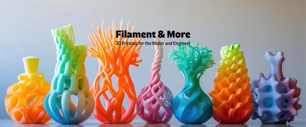 Colorful 3D-printed objects on a gray background with 'Filament & More' branding.