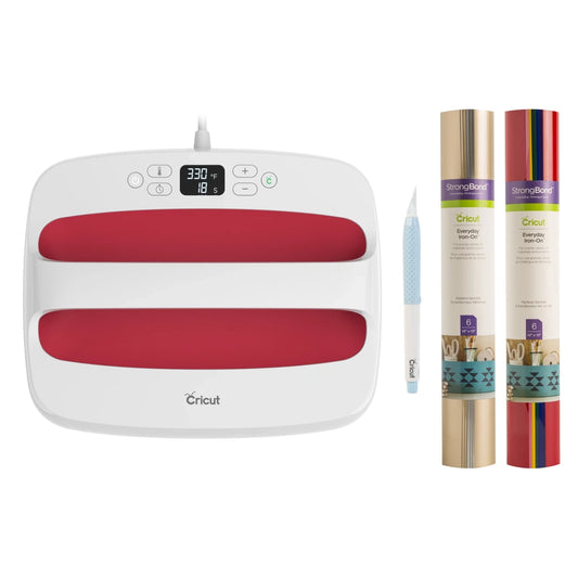 Cricut machine with rolls of vinyl and a pen on a white background