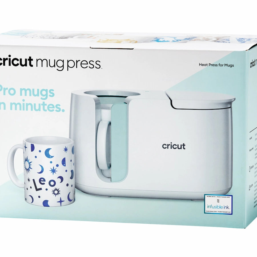 Cricut mug press retail packaging showing a white heat press machine and a white mug with blue moon and sun illustrations on a clean white background.