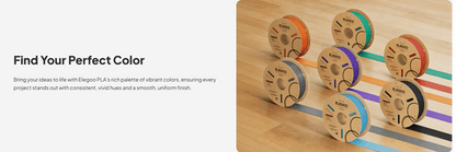 Wooden spools of colorful filament on a wooden surface with text 'Find Your Perfect Color'.
