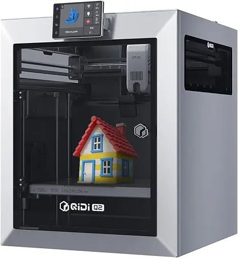 3D printer with a colorful house model on a black platform, branded 'Ridi Q2'.