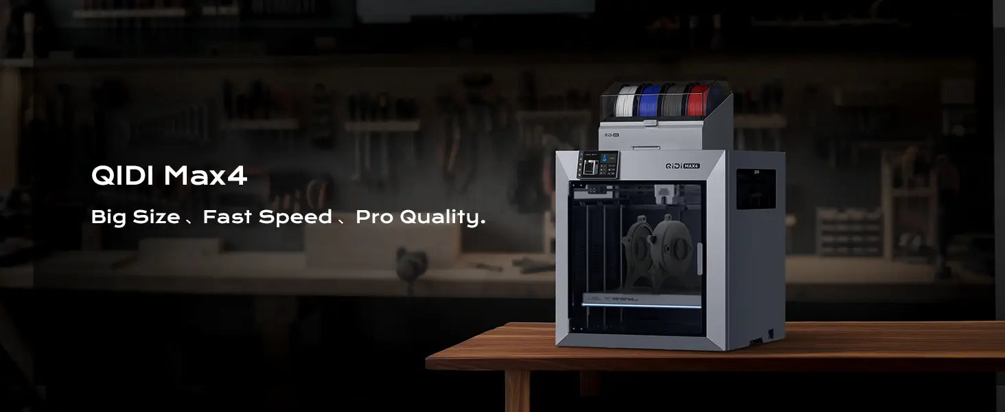 QIDI Max4 3D printer on a wooden table with a blurred workshop background