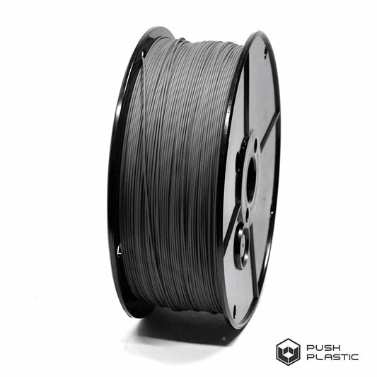 Spool of gray filament on a white background with 'Push Plastic' branding.