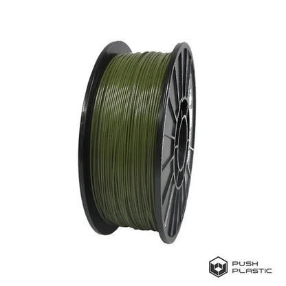 Spool of green filament on a white background with 'Push Plastic' branding.