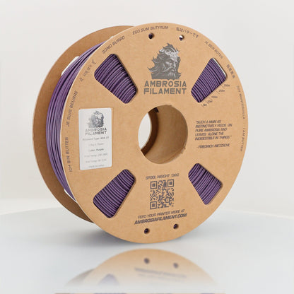Spool of Ambrosia Filament with purple material on a white background