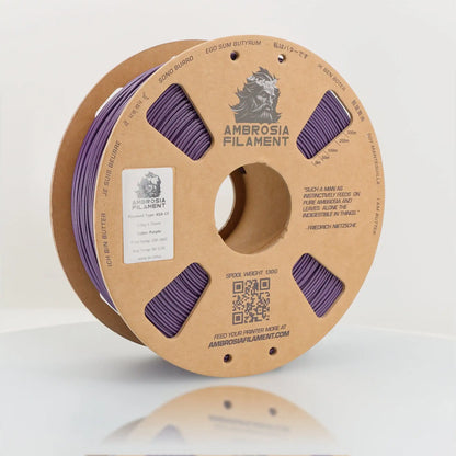 Spool of Ambrosia Filament with purple material on a white background