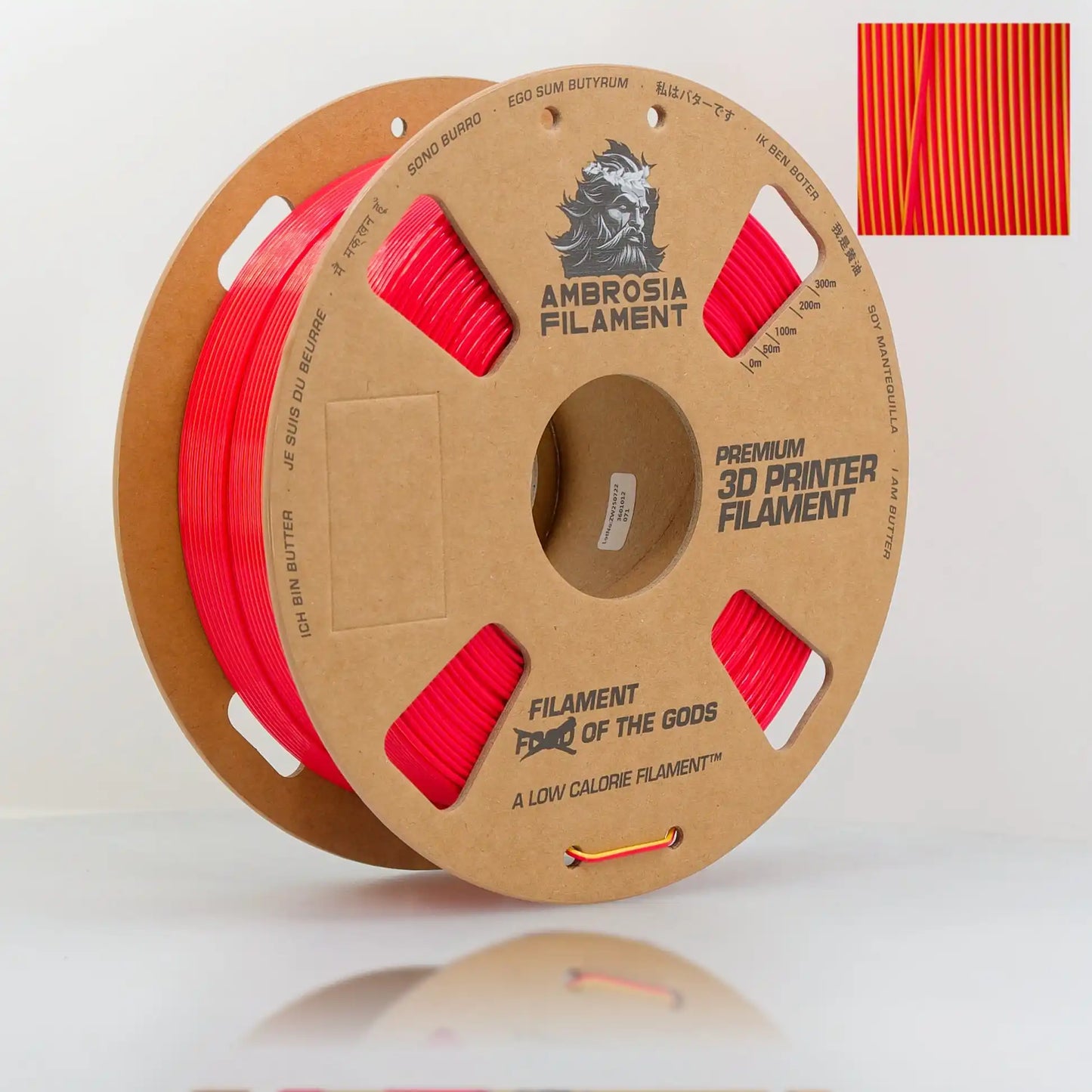 Spool of red 3D printer filament with Ambrosia Filament branding on a white background.