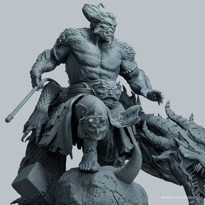 Statue of a muscular figure on a dragon-like creature with detailed armor and weapons.