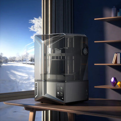 Modern coffee machine on a wooden table with a snowy landscape outside the window