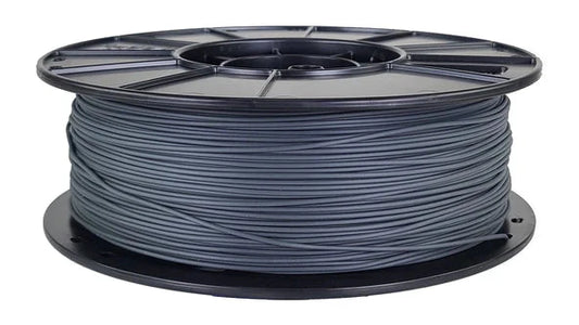 Spool of gray filament on a white background