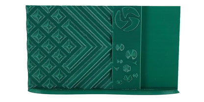 Green fabric with geometric patterns and a logo on a white background