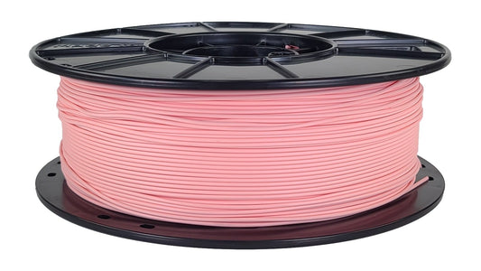 Spool of pink filament on a white background
