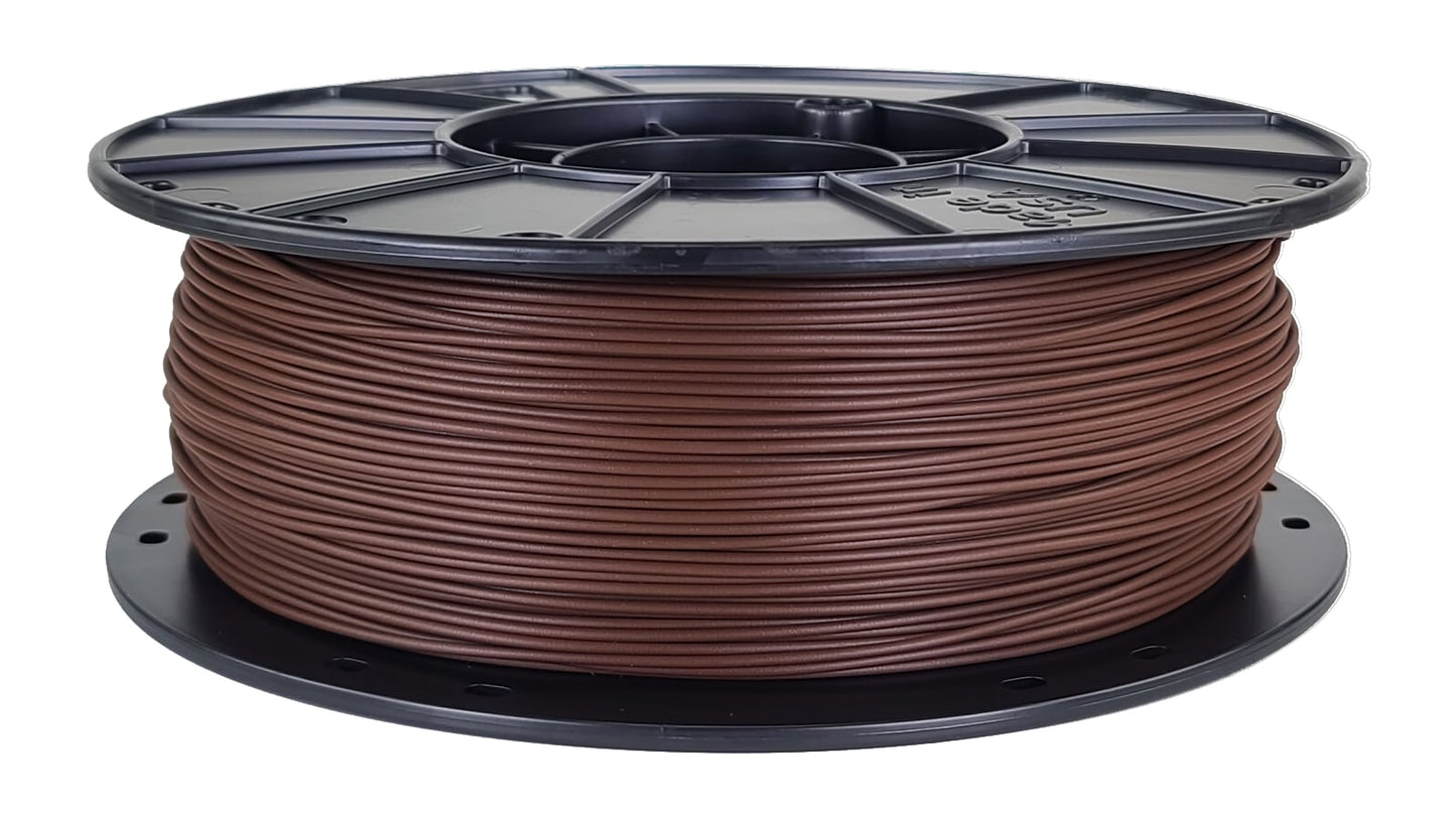 Spool of brown filament on a white background