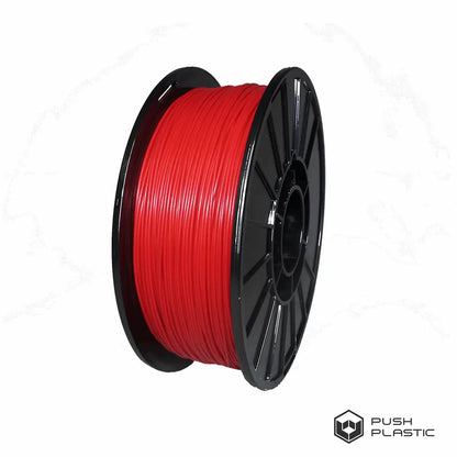 Spool of red filament on a black spool with 'Push Plastic' branding.