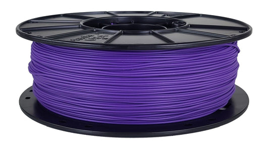 Spool of purple filament on a white background