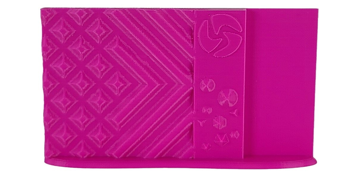 Pink textured product with geometric patterns on a white background